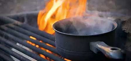 Cooking on a campfire stove in the cool mountain air around Sedona Arizona